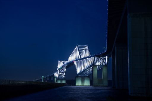 View of lit up bridge at night