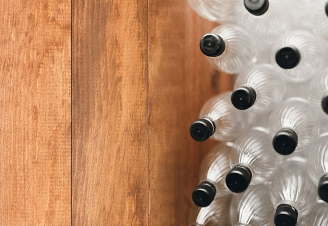 plastic bottles on wooden floors