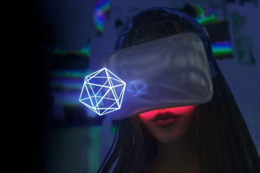 Woman in VR headset looking at holographic shape