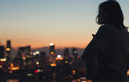 Woman looking at city lights