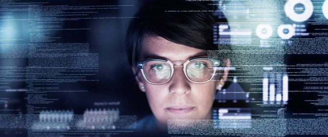 Woman wearing specs while working