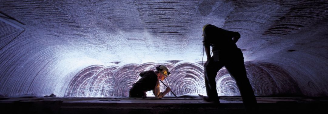 Men working in an underground potash mine